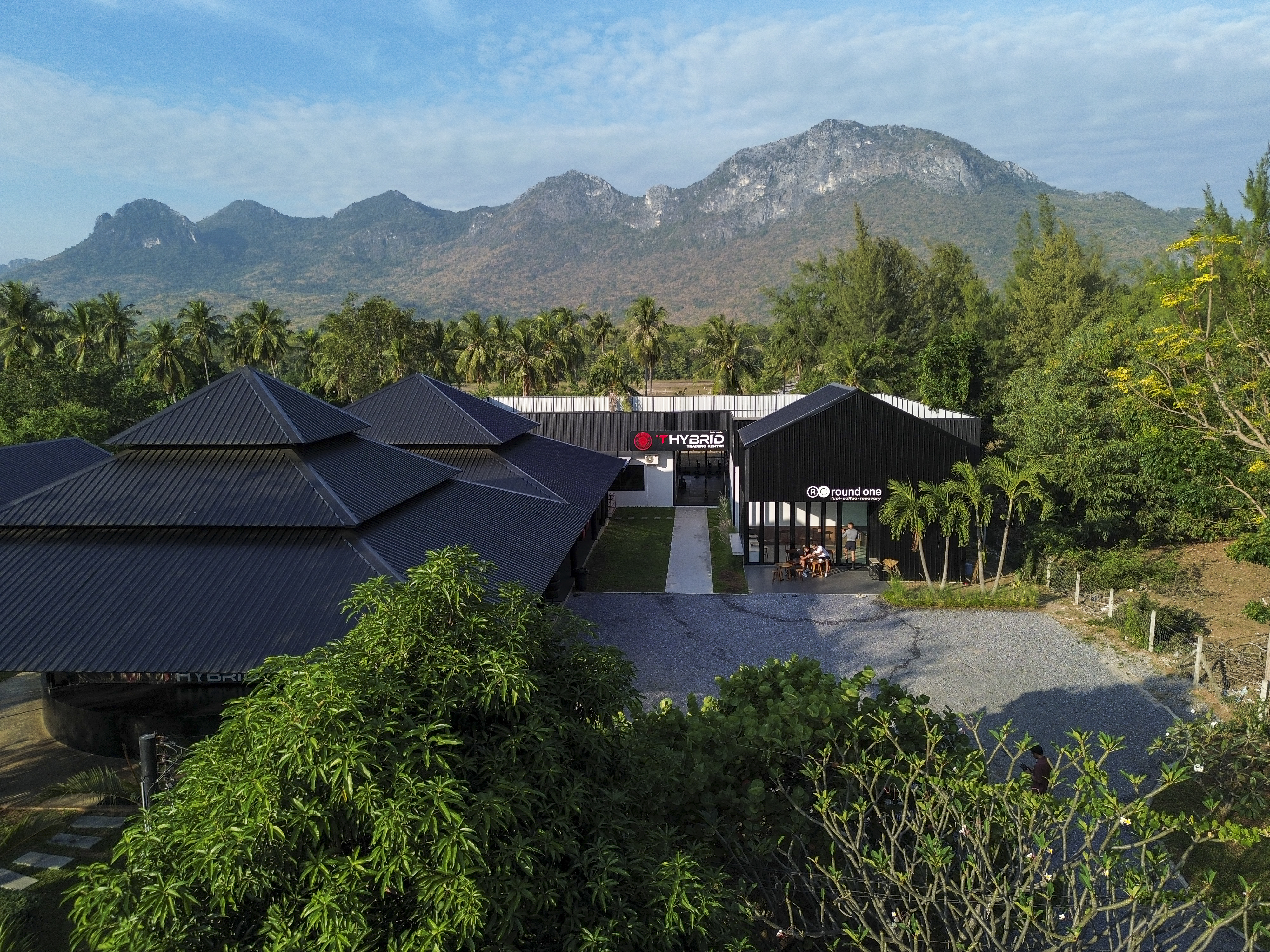 Aerial view of the Thybrid training compound beneath the Sam Roi Yot ridge line