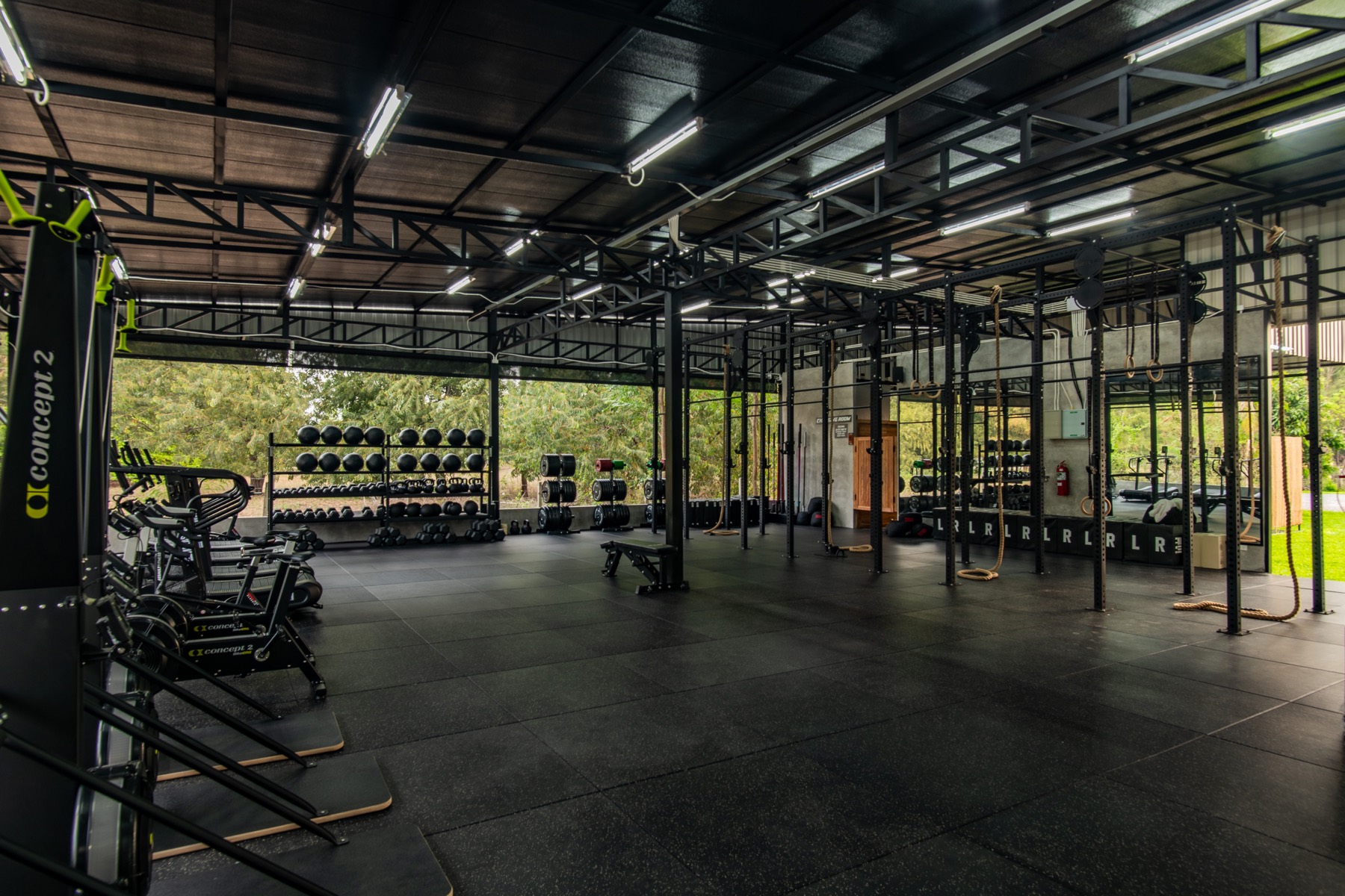 The open-air training floor looking out toward the mountains